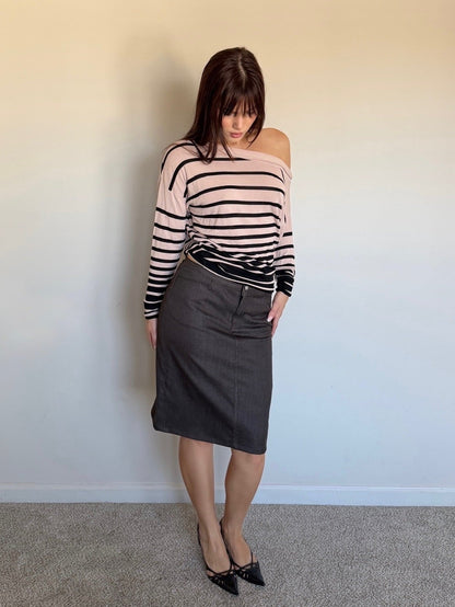 cream and black longsleeve that is off the shoulder with brown skirt and black heels