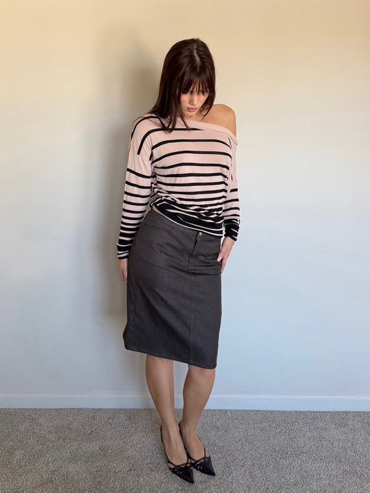 cream and black longsleeve that is off the shoulder with brown skirt and black heels