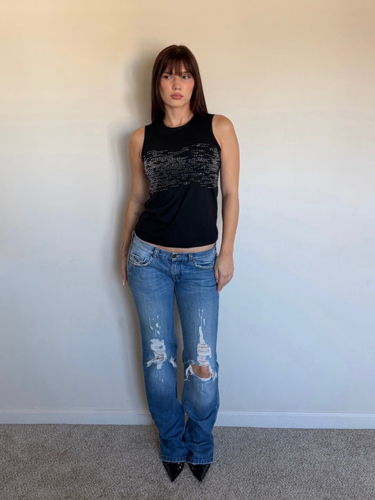 black tank with distressed jeans and black heels