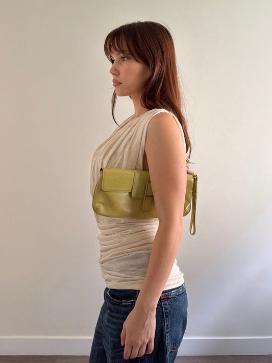 green clutch with outfit