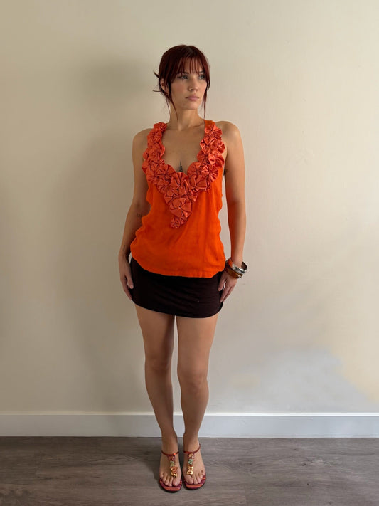 orange top and brown skit outfit