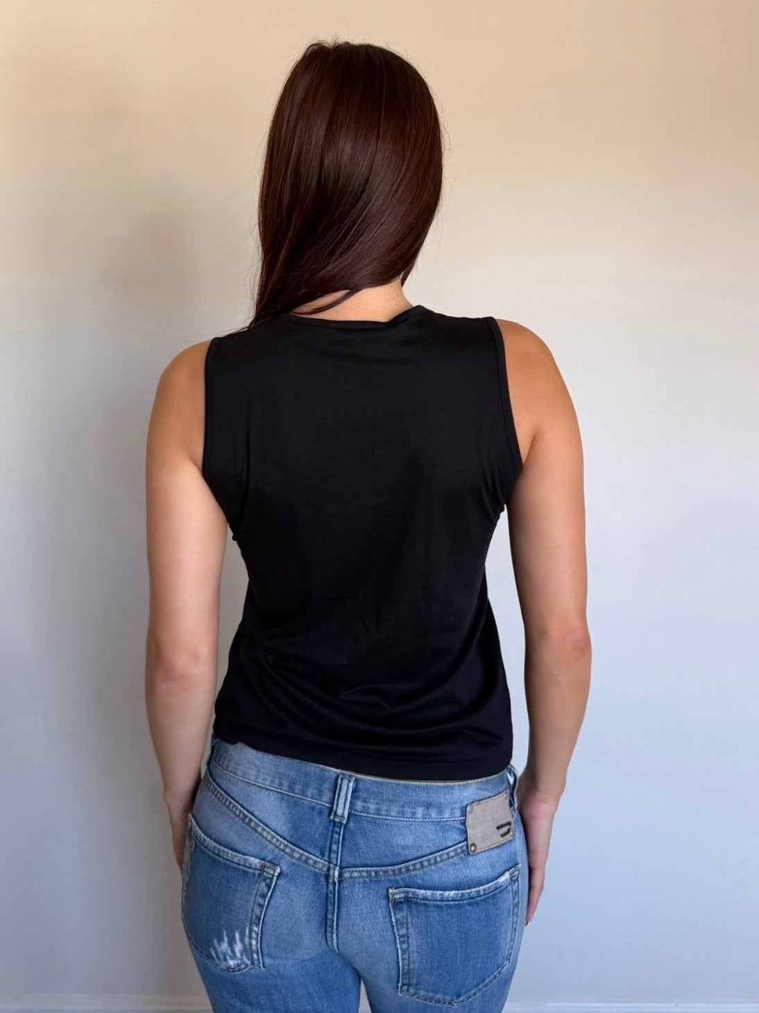 backside of black tank