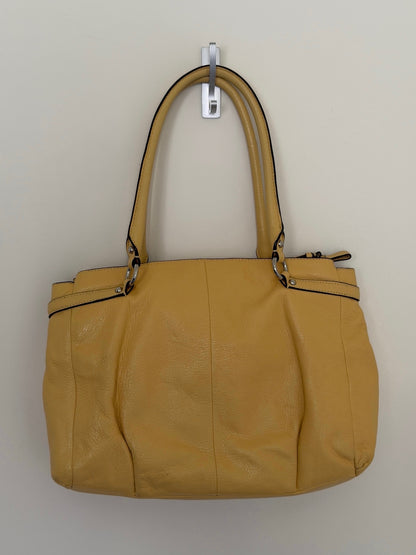 Yellow handbag on a white background