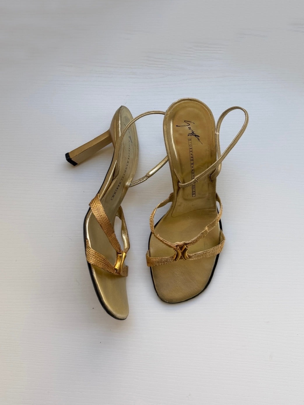 photo of gold Giuseppe heels