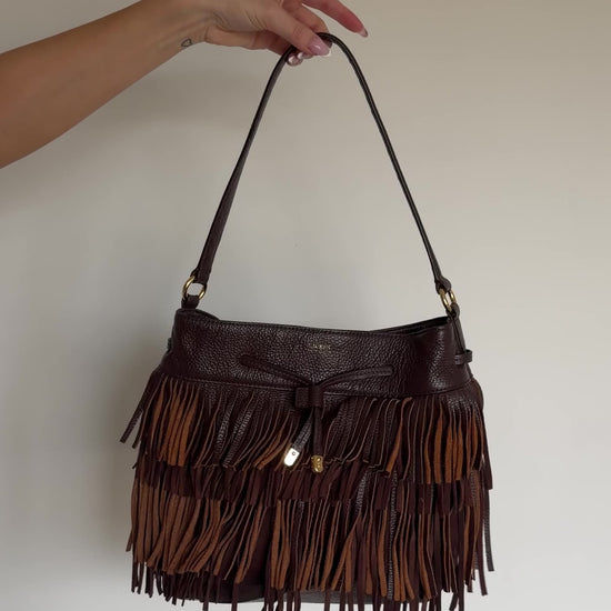 video of fringe leather bag