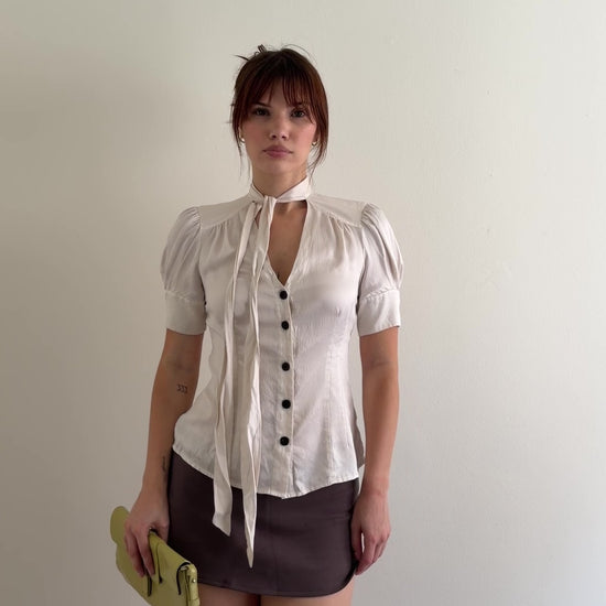 video of cream blouse with tie