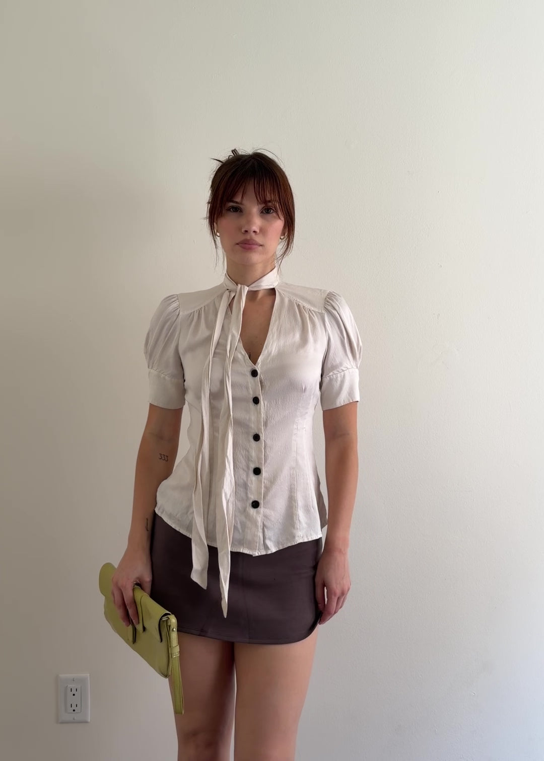 video of cream blouse with tie