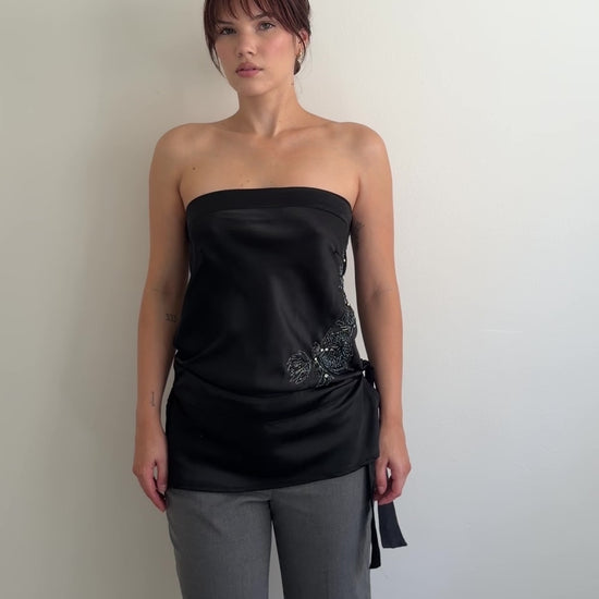  video of black strapless top shown from different angles