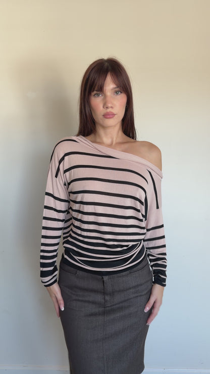 video of a cream and black longsleeve that is off the shoulder