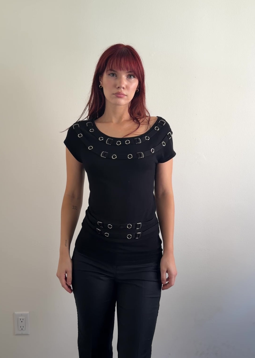 video of black top with silver detail
