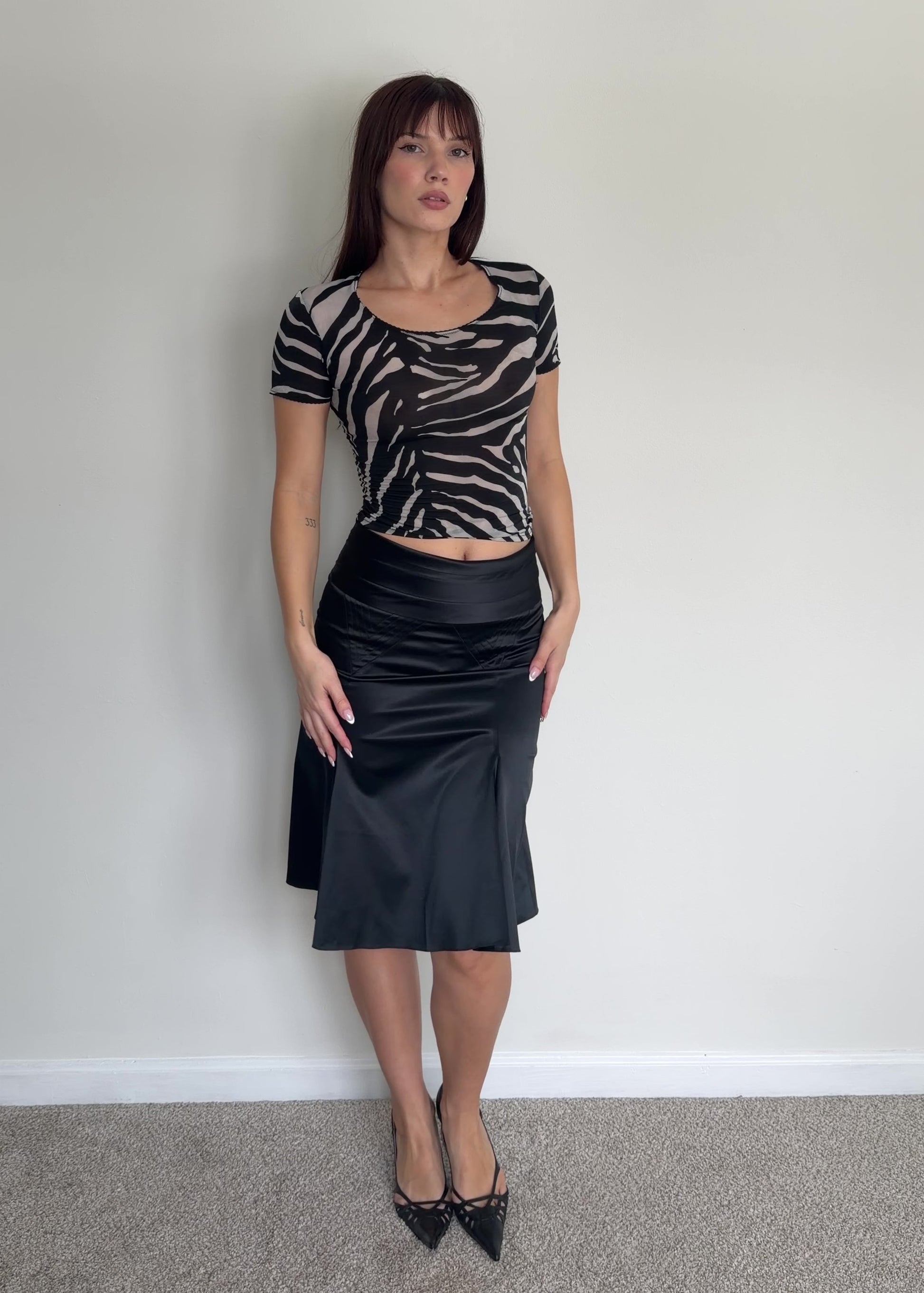 video of zebra top and just cavalli blak skirt 