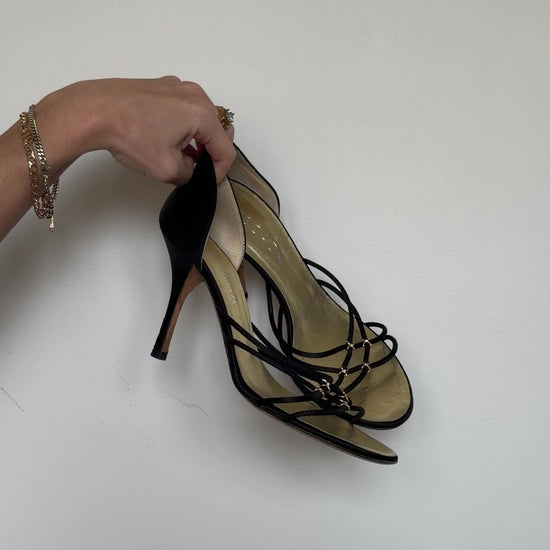 video of black strappy heels 
