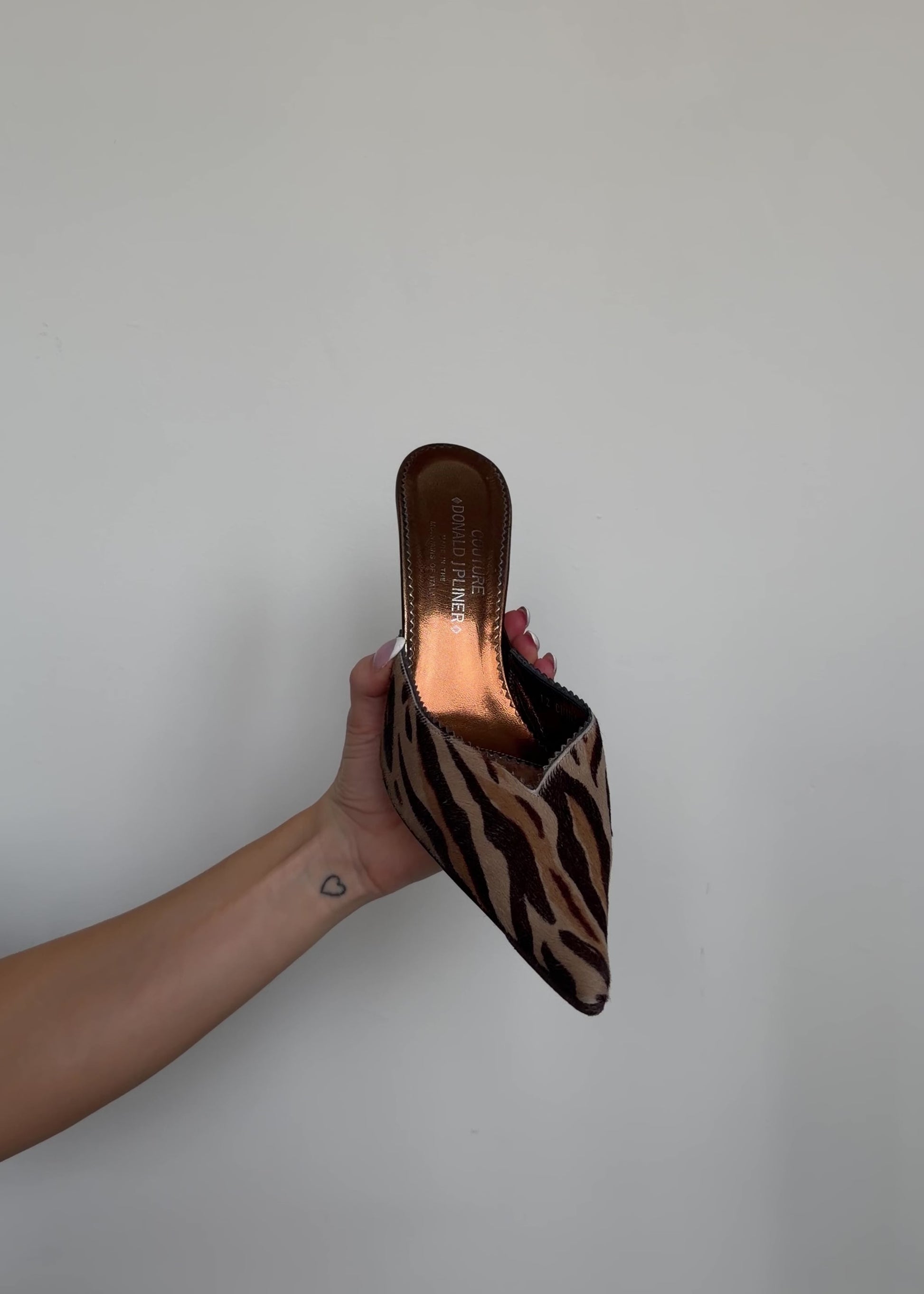 video of donald pliner cheetah heels