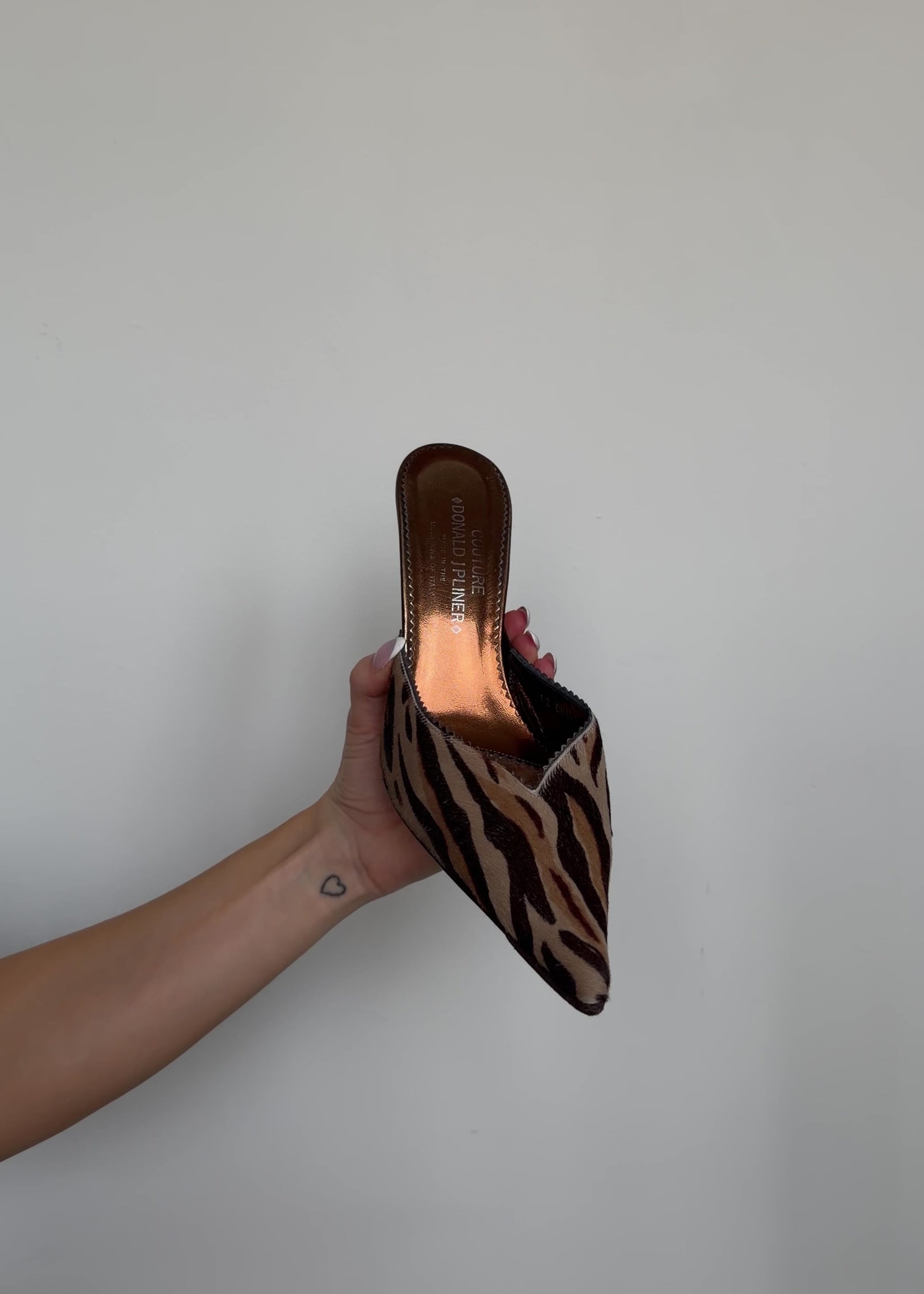 video of donald pliner cheetah heels
