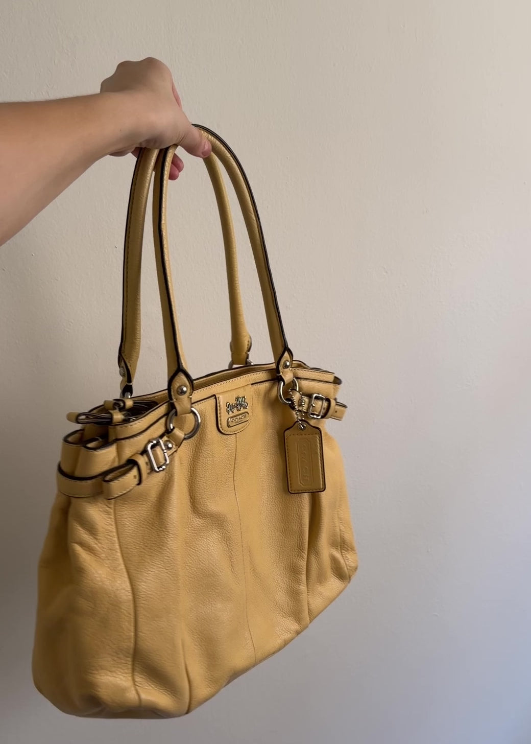 video of yellow coach bag